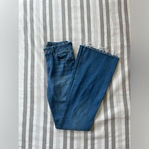 denim flared jeans with frayed ends